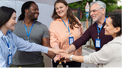 People volunteering, representing volunteering liability.